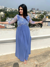 Smokey blue pleated gown