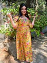 Floral print pleated tissue dress in mustard yellow