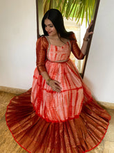 Tie and dye orange fully pleated gown in silk