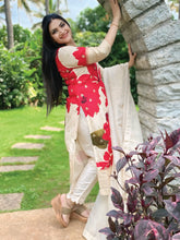 Beige suit with red floral print