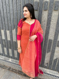 Salwar suit in brick and pink