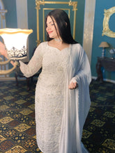 White heavily embellished suit combo