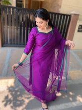 Rich Purple suit combo in soft silk with emerald green contrast lace borders