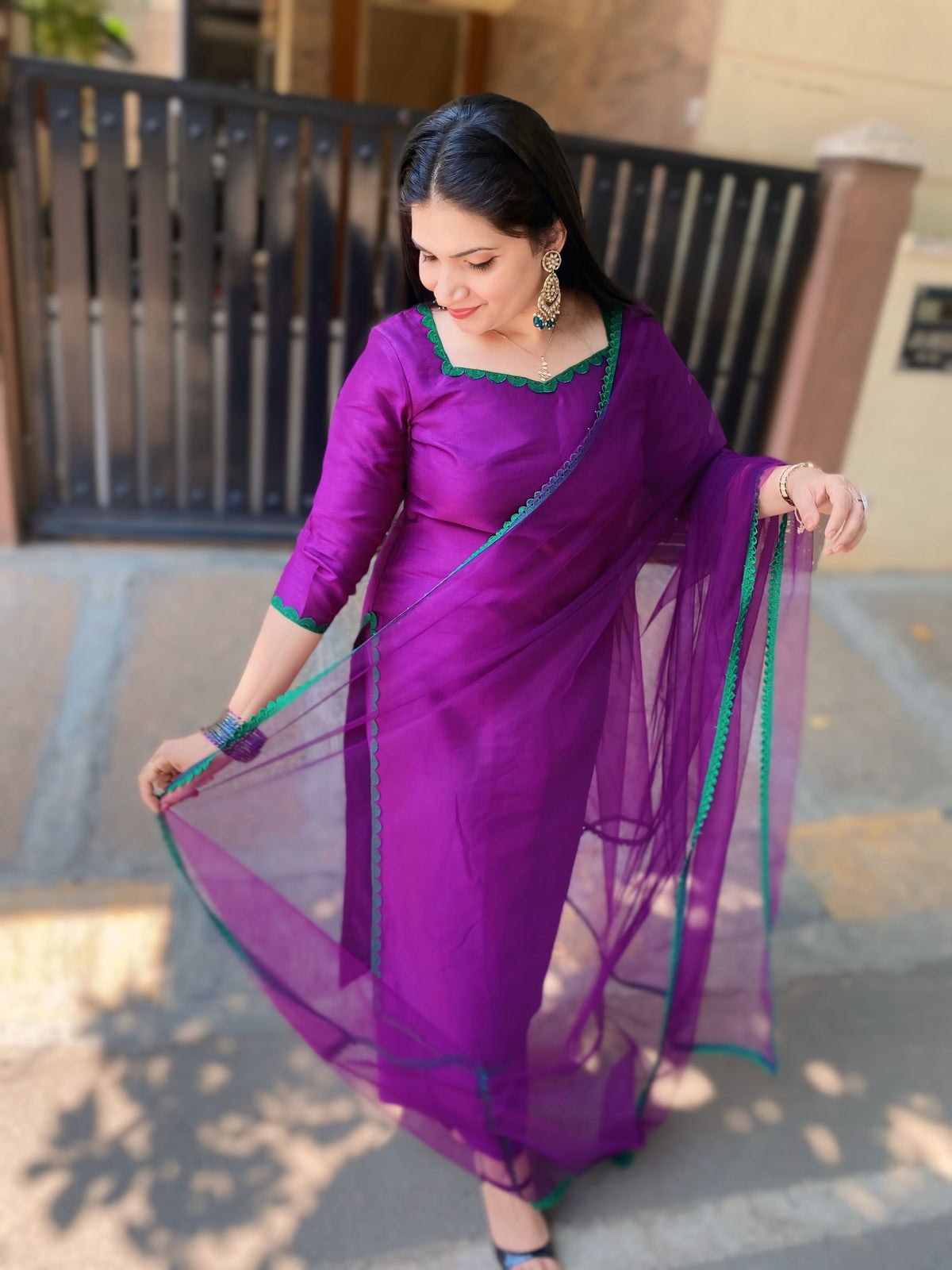Rich Purple suit combo in soft silk with emerald green contrast lace borders